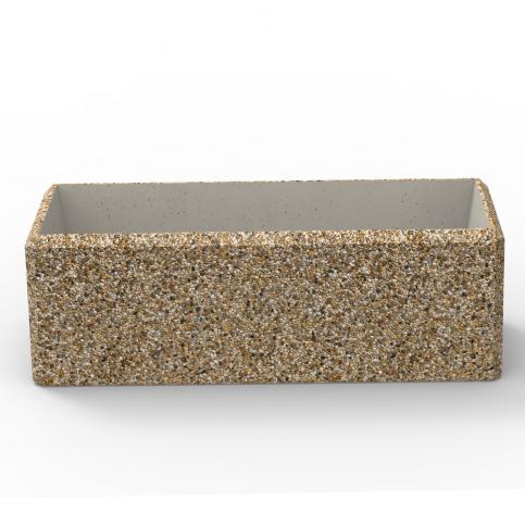 Betonowa donica AGATA wykonana w technologii betonu płukanego z charakterystyczną warstwą odsłoniętego kruszywa.